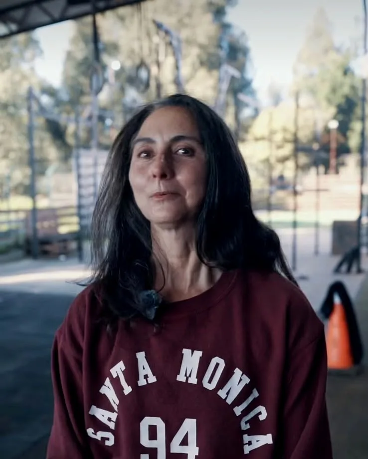 Alumna dando su testimonio
